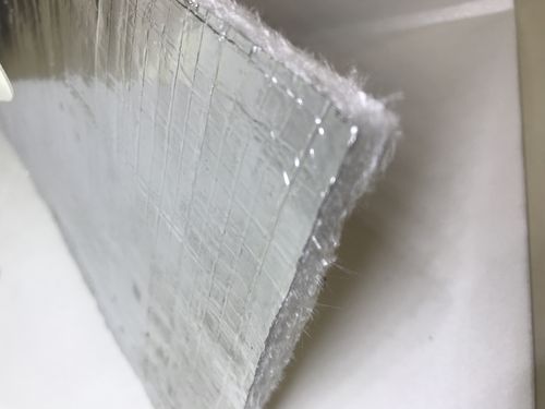 Feuille d'isolant  alu fibre de verre adhésive